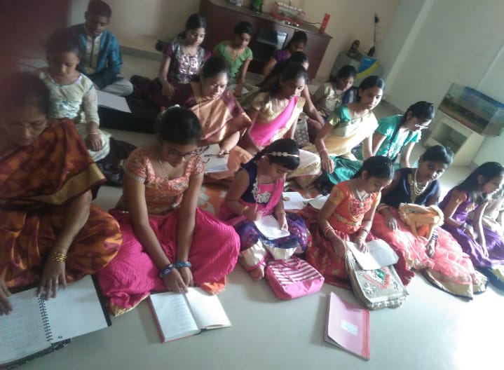 Students and parents gathered for a session